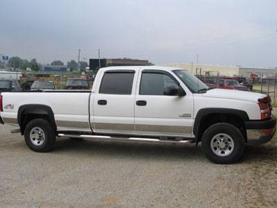 05 Chevy Silverado 2500HD with Luverne 3" Stainless Steel W2W Nerf Bars and SST Rocker Moldings