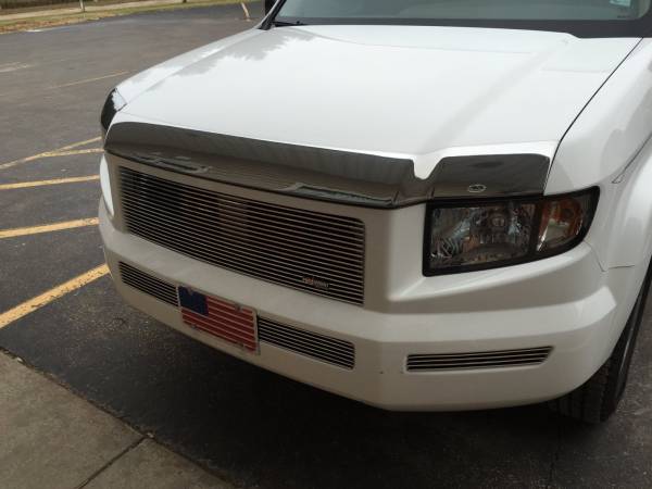 Protect your truck from debris in style with an AVS Chrome Bug Shield!