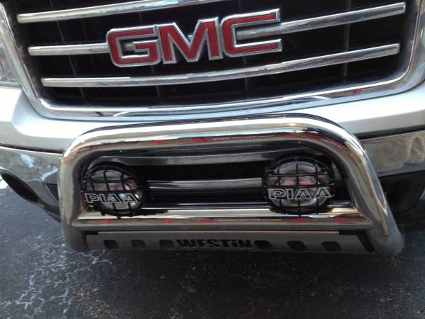 Get that off-road look with a Westin Stainless Steel Bull Bar and PIAA Driving Lights!