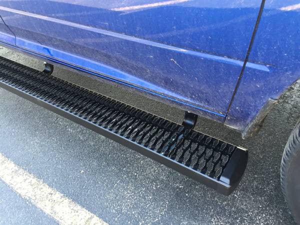 These black Luverne wheel to wheel Grip Step Running Boards provide saftey and convenience!