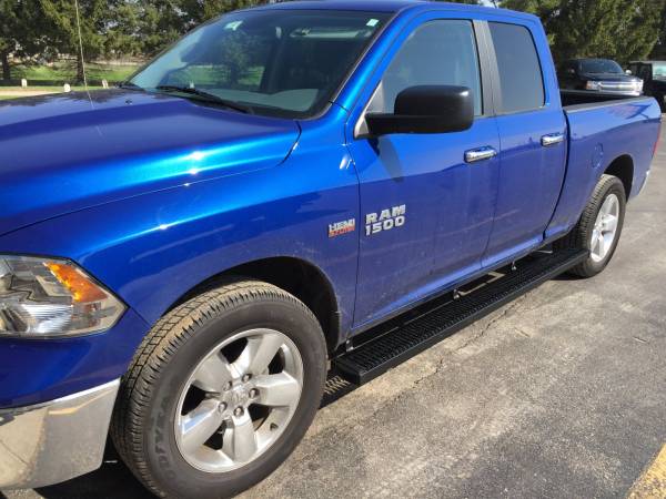 2013 Dodge RAM Quad Cab with Luverne Black wheel to wheel GripStep Running Boards