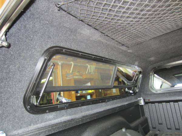 A close look at the Jason Pace Series truck cap's sliding side windows