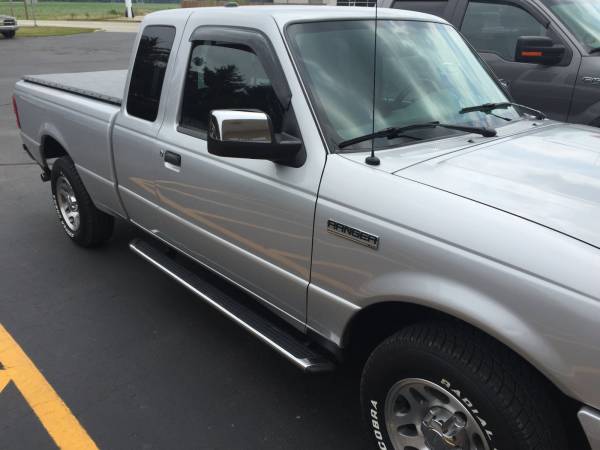 2011 Ford Ranger EXT Cab with Westin Smoke Bug Shield and Window Visors and an Extang Full Tilt Tonneau Cover!