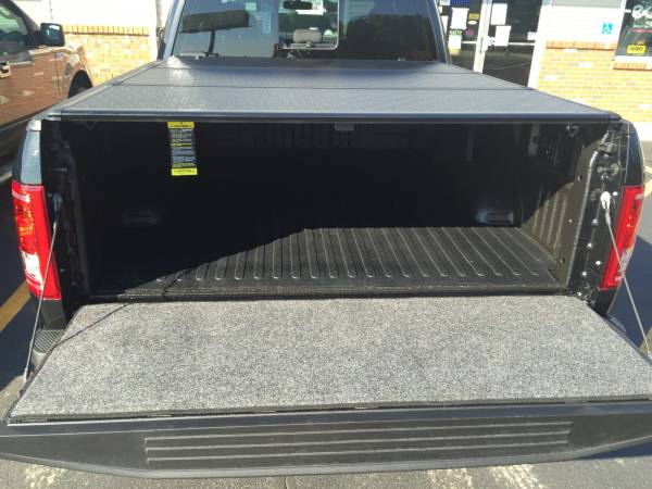 An Extang Encore tonneau cover and a BedRug Tailgate mat!