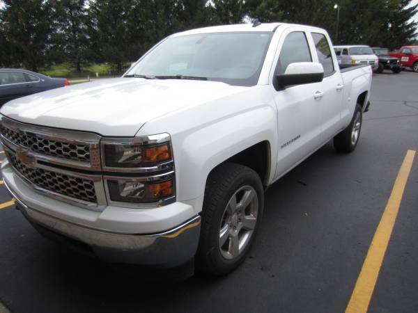 A 2015 Chevy Silverado Double Cab with Amp Power Boards 