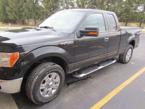 2013 Ford F-150 Super Cab w/ Luverne Regal 7" SST Boards and a Torza Top Tri-Fold Tonneau