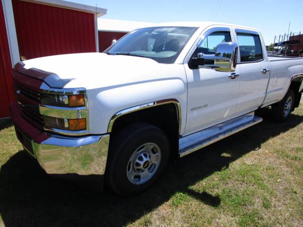 2016 Chevy Silverado with TFP Fender Lip Trim and AVS Chrome Aeroskin and Rain Guards!