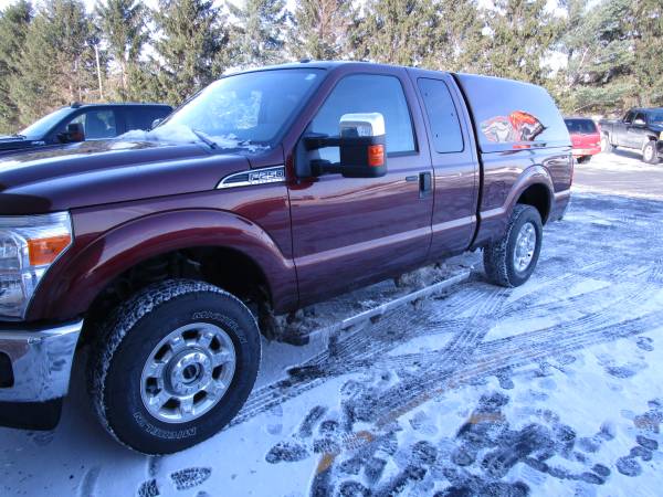 2016 Ford F-250 Super Duty 6.5' with a Jason Pace Truck Cap