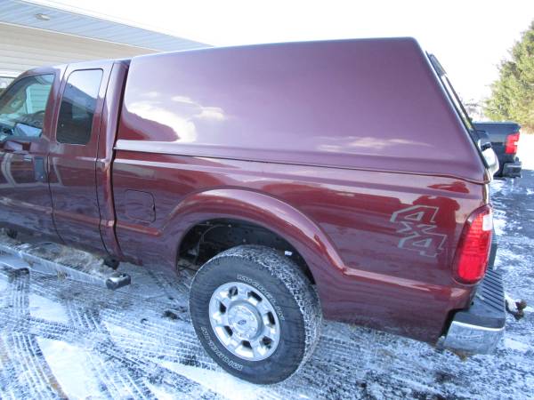 The sleek Jason Pace Cap (Windowless Option) on a 2016 Ford F-250 Super Duty