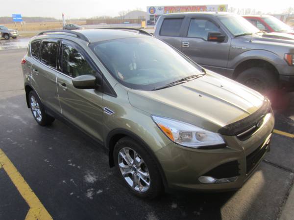 16 Ford Escape with AVS VentVisor and Hoodshield and Weathertech mudflaps!