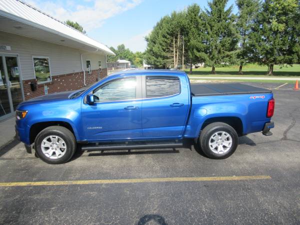 Chevy Colorado With New Runnding Boards, SolidFold Bed Cover, and AVS Winddefelctors.