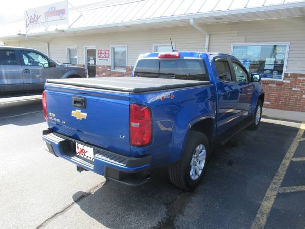 Chevy Colorado With New Runnding Boards, SolidFold Bed Cover, and AVS Winddefelctors.