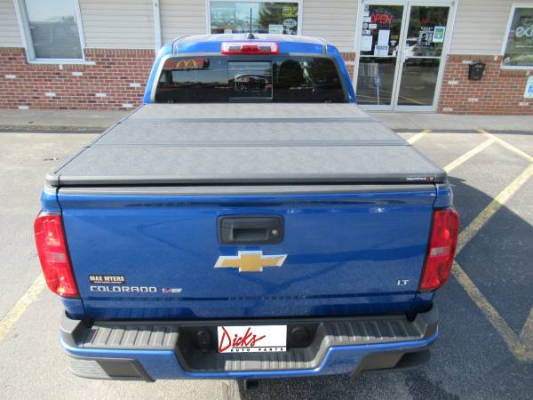 Chevy Colorado With New Runnding Boards, SolidFold Bed Cover, and AVS Winddefelctors.