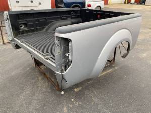 05-21 Nissan Frontier Silver 5 ft King Cab Short Bed