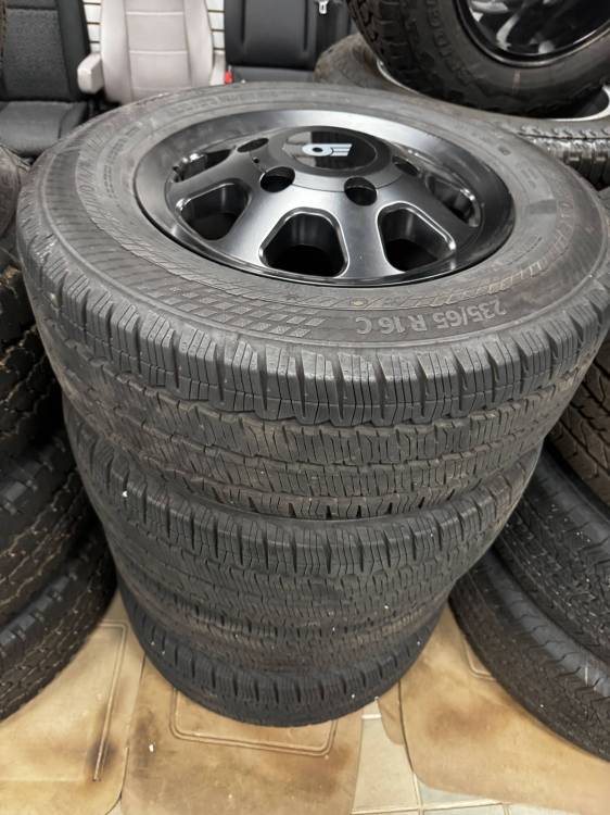 20-25 Transit AWD Ford Transit 150/250/350 16-inch 6 Lug Black Wheels with 235/65/16 Load Range C Continental VanContact A/S Black Wall Tires