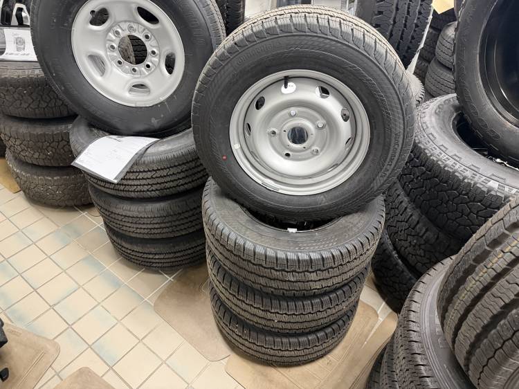 Ford  - 15-25 Ford Transit 150 250 350 16" 5 Lug Silver Steel Wheels with 235/65/16 Load Range C Continental VanContact A/S Black Wall Tires