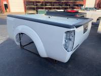 05-21 Nissan Frontier White 6 ft King Cab Short Bed - Image 3