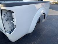 05-21 Nissan Frontier White 6 ft King Cab Short Bed - Image 13