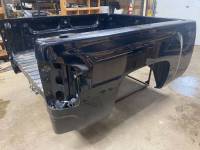 Used 07-13 Chevy Silverado 1500/2500/3500 6.6ft Black Short Bed. - Image 1