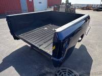 Nissan  - Used 16-18 Nissan Titan XD w/ 5.0L Diesel Crew Cab 6.6 ft Blue Bed (Diesel Only) - Image 1
